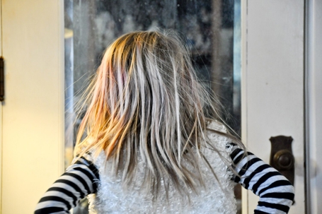 girl looking out window