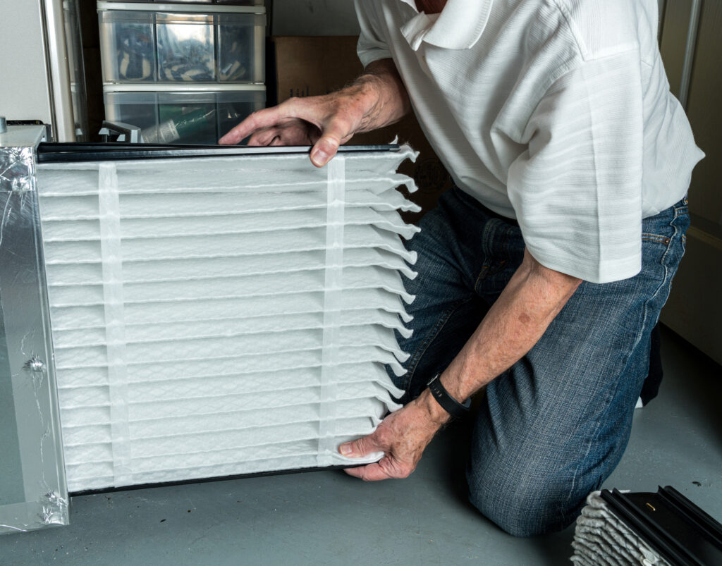Homeowner changes furnace filter